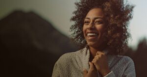 Young girl smiling outside