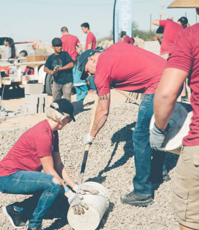 LV workers building a house